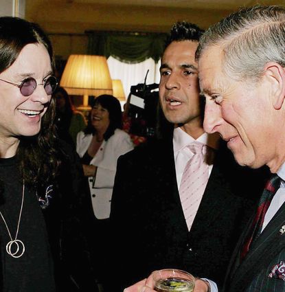 King Charles laughing with Ozzy Osbourne