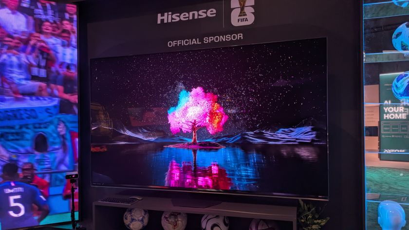 Hisense 85-inch RGB mini-LED with pink tree against night sky on screen 