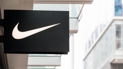 Nike logo is seen outside of their retail store.