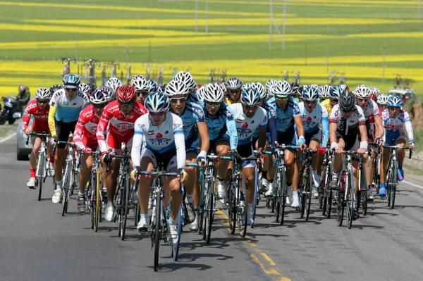 The main group rides a small climb.