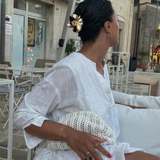 tegan poses for pictures while on a summer vacation