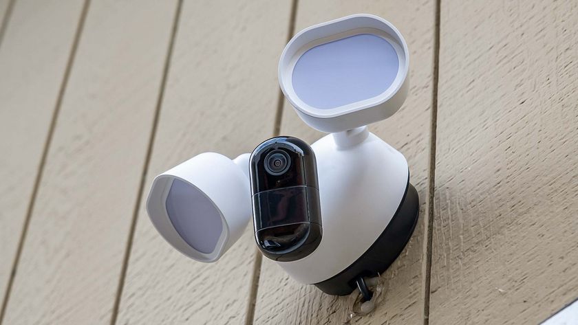 Arlo Wired Floodlight Camera attached to side of house