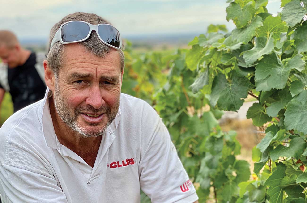 Mark Haisma in vineyard