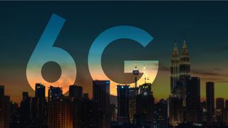 Letters '6G' displayed behind the Kuala Lumpur city skyline at dusk