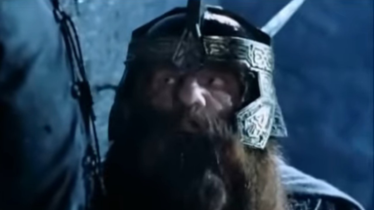 John Rhys-Davies looking up at the battle of Helm's Deep in The Lord of the Rings: The Two Towers
