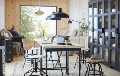 Home office lighting: pendant lights over a dining table