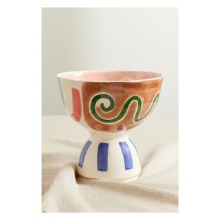 ceramic fruit bowl with painted colorful shapes