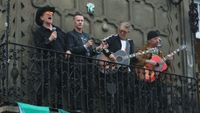 U2 perform from a balcony for Mexican fans in Mexico City on May 12, 2026 in Mexico City,