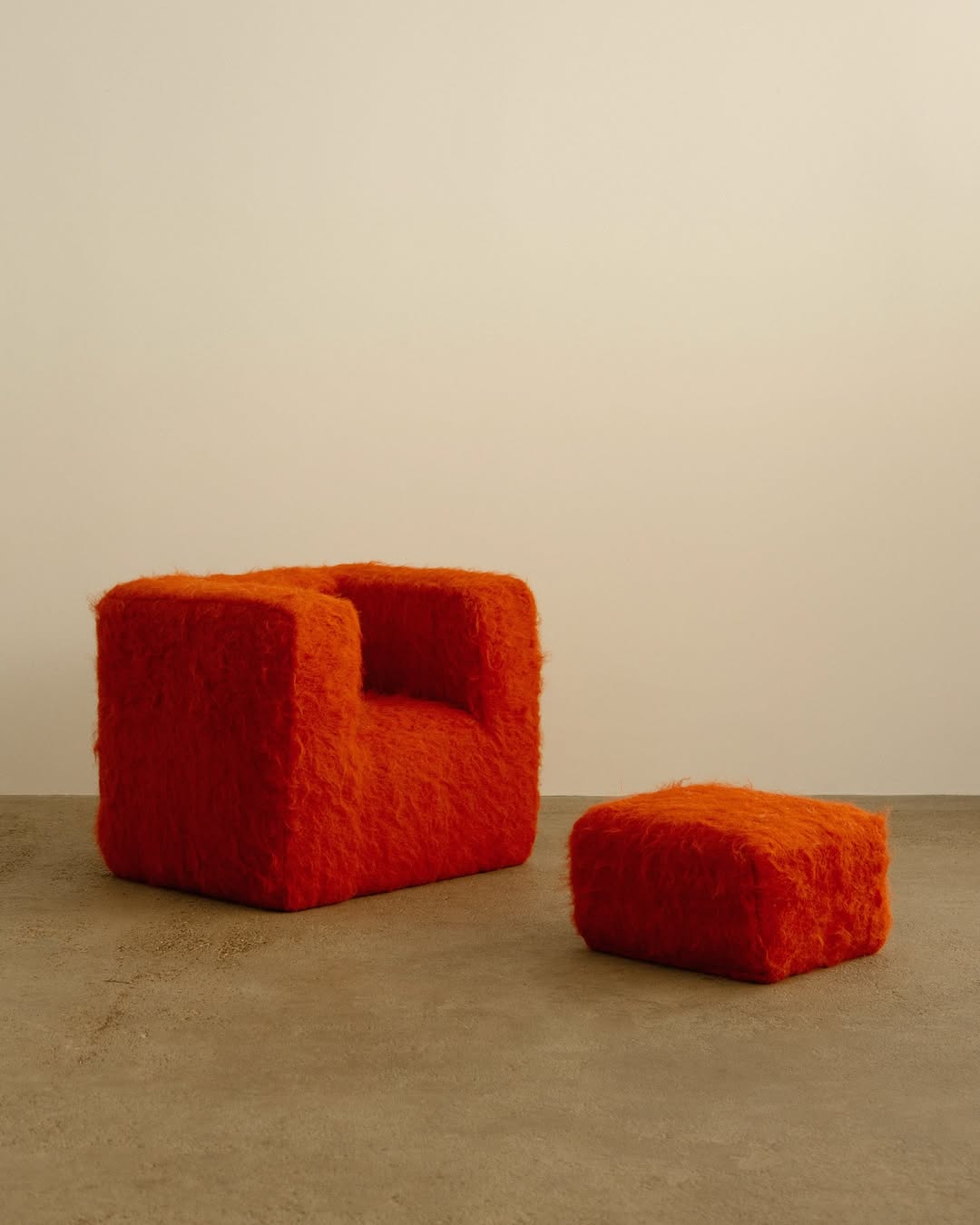 Grace Atkinson textiles on cubic shaped chair and ottoman