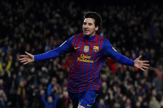Lionel Messi celebrates after scoring his fourth goal for Barcelona in a 5-1 win over Valencia in February 2012.
