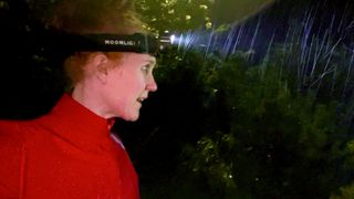 Ultimate winter running checklist: Woman wearing Moonlight Bright As Day 800 running headlamp at night