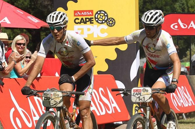 Jaroslave Kulhavy and Christoph Sauser of Burry Stander - Songo cross the line in third place