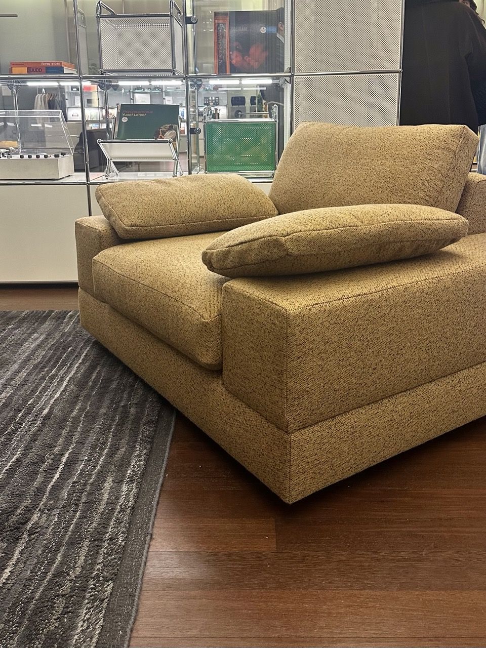 A different angle of the same mustard arm chair.