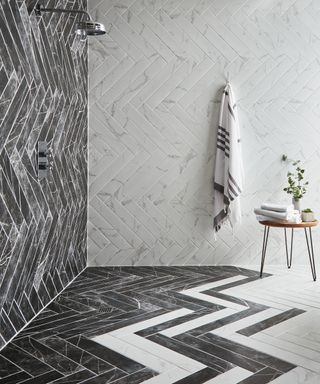 Black and white marble shower wall and floor tiles by Walls and Floors