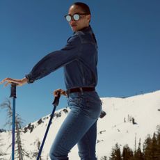 model on the mountains wearing levi's denim