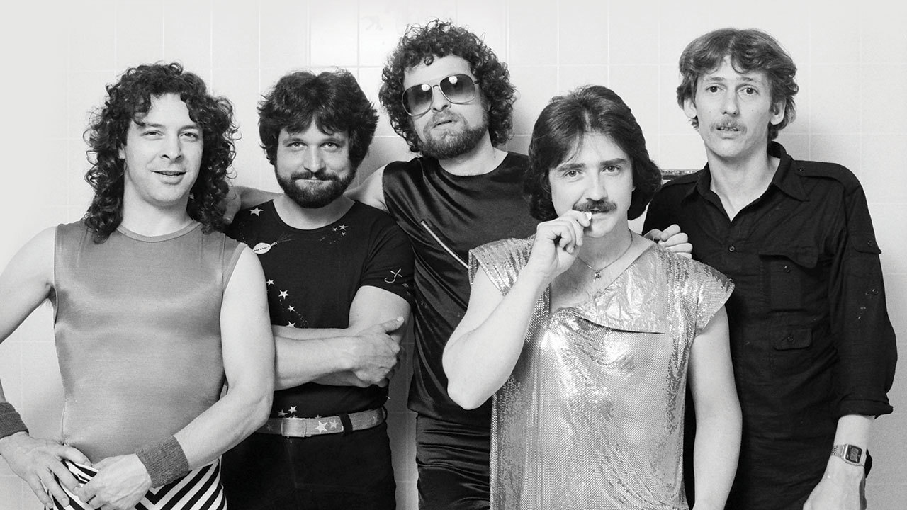 Blue Oyster Cult posing for a photograph in the 1980s