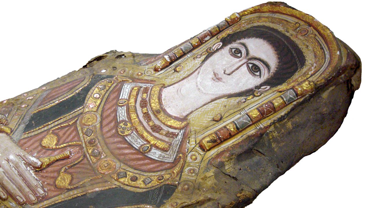 Just like her mummy portrait shows, this young woman was buried with multiple necklaces.
