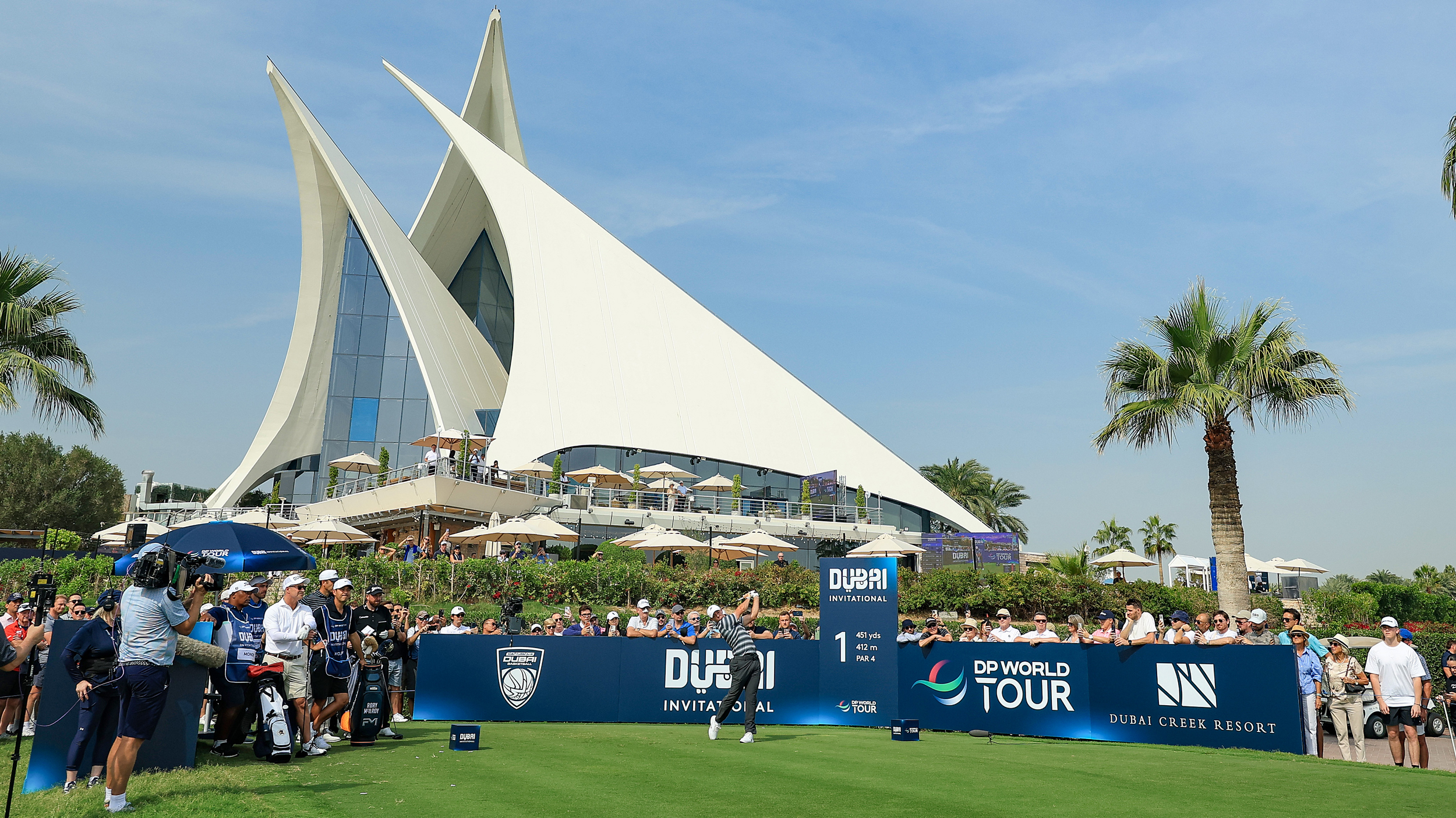 Rory McIlroy tees off on the first hole at Dubai Creek Golf Club in the 2026 Dubai Invitational