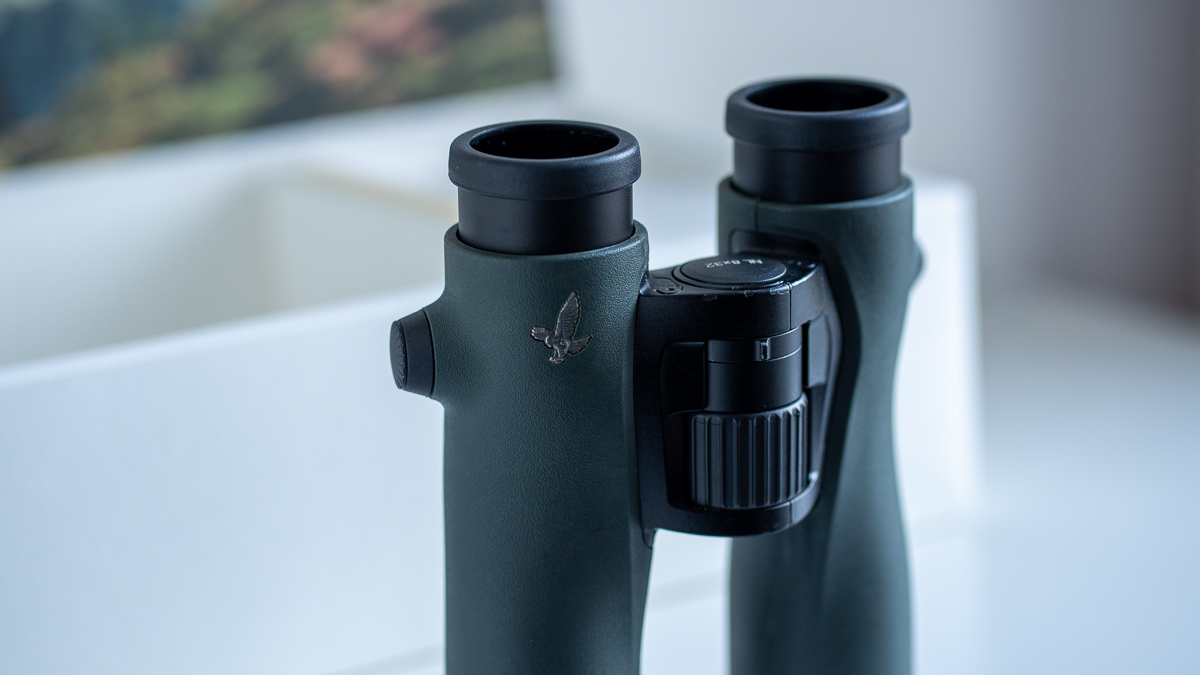 Swarovski NL Pure 8x32 binoculars on a white surface