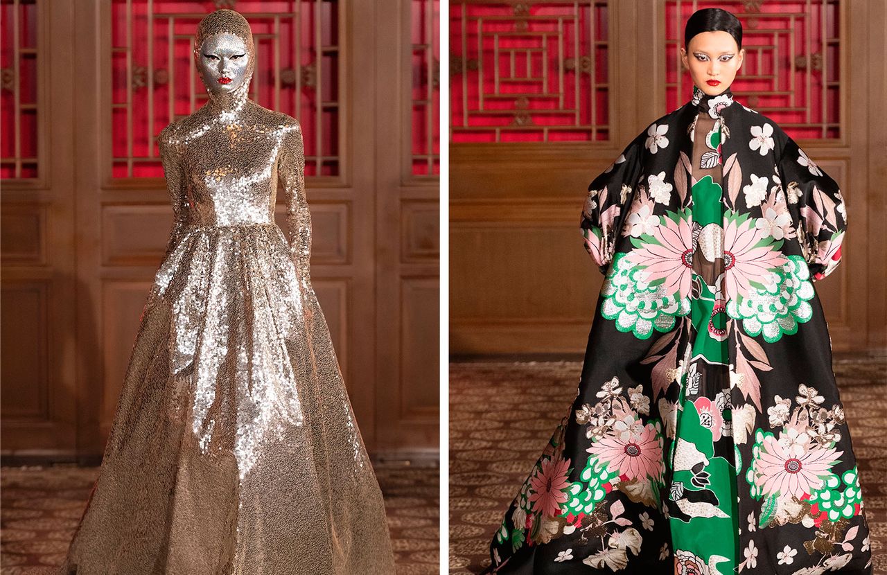 Two side-by-side photos of models walking the Valentino Beijing Haute Couture 2019 show. In the first photo a model has a glittery silver painted face and is wearing a floor length, long sleeve sequin dress which covers her head. And in the second photo a model is wearing a floor length black, green and pink floral piece