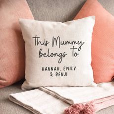 Manta Makes Personalised This Mummy belongs to Cushion on grey sofa with other pink cushions