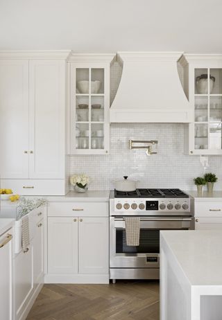 white kitchen with zellige splashback by Victoria Holly Interiors