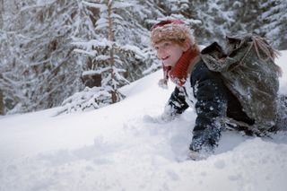 Young Santa in the snow in 'A Boy Called Christmas'.
