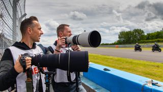  PhotoPlus reader Phil Perry with Canon pro Moto GP photographer Rob Gray on Apprentice shoot at Donington race track