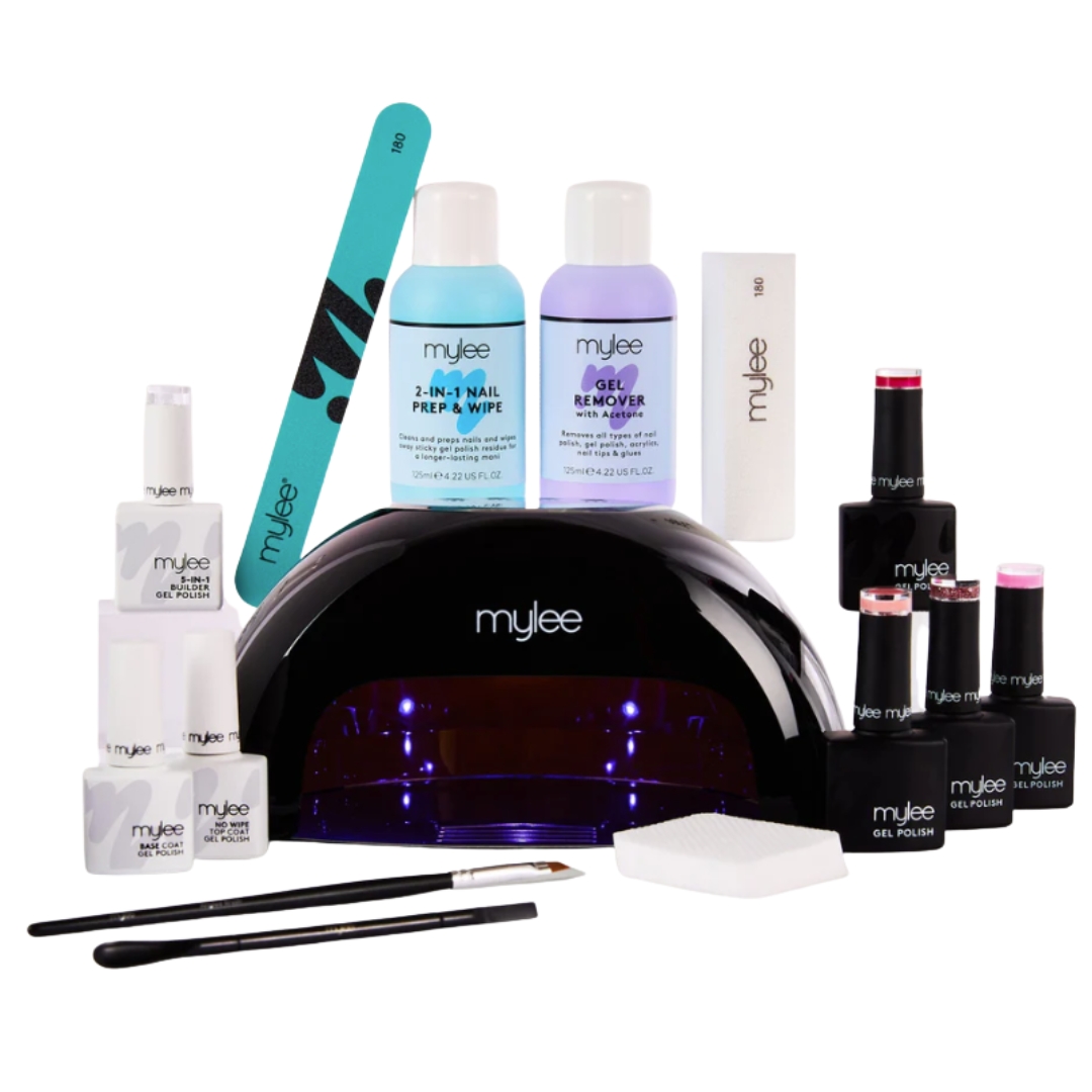 A product shot of the Mylee The Main Kit, which features a UV/LED lamp, seven polishes and a range of tools and gel remover formulas to help you create a complete gel manicure at home/ on a white background