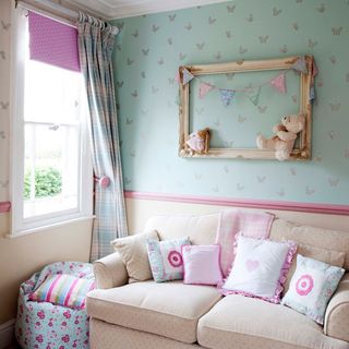 kids bedroom with sofa and cushions