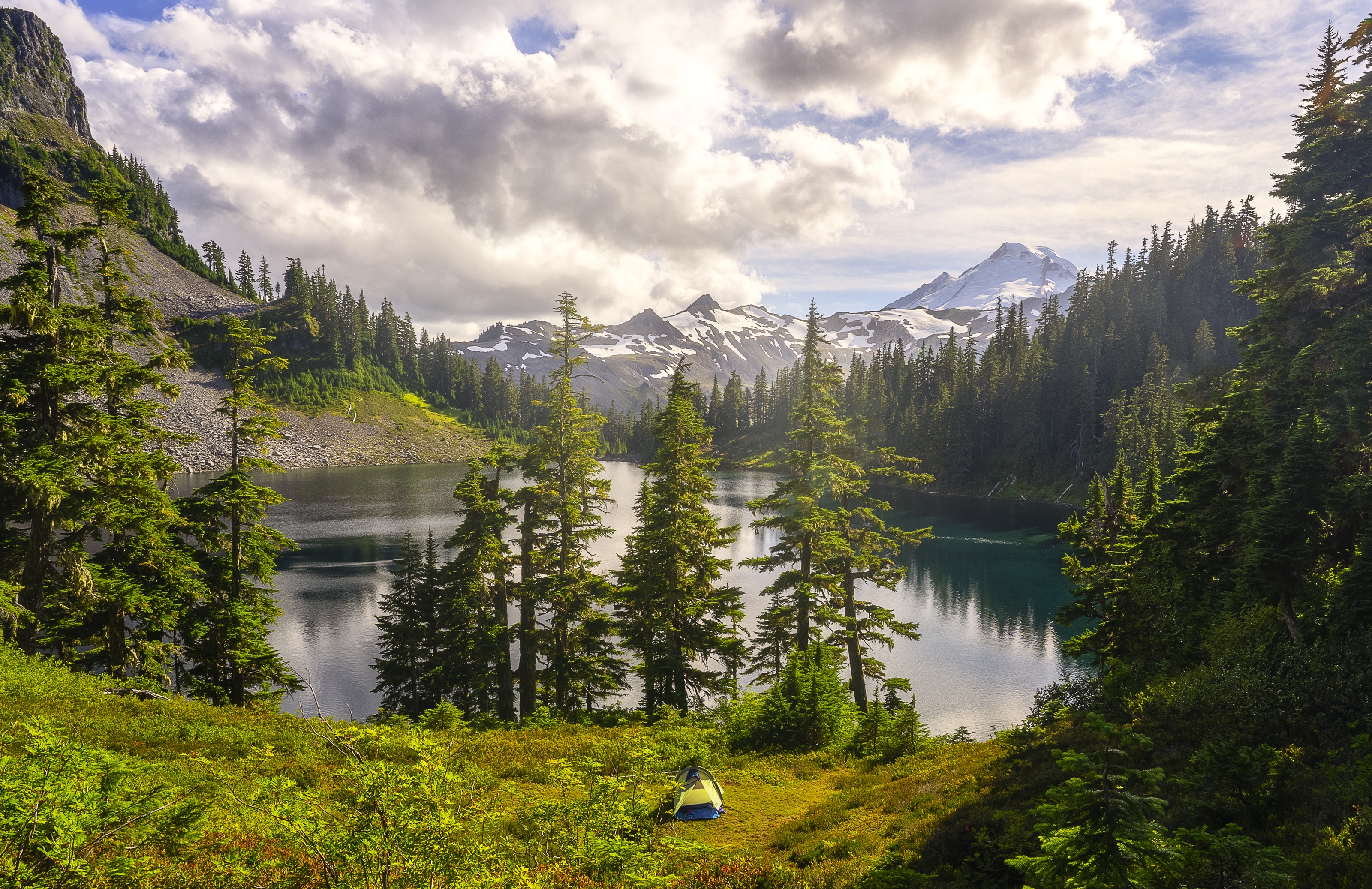 A view of the Pacific Northwest and a tent.