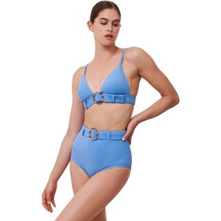 model wearing pastel blue bikini with belt