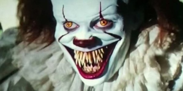 Pennywise Bursts Through the projector screen in IT