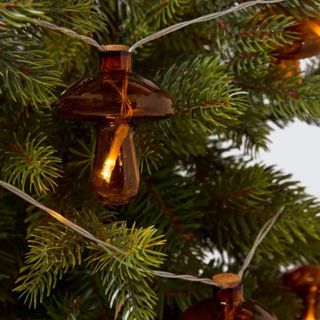 mushroom christmas lights on a tree