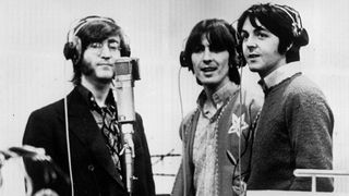 1968: Three Beatles; from left to right John Lennon (1940 - 1980), George Harrison (1943 - 2001) and Paul McCartney, record voices in a studio for their new cartoon film Yellow Submarine