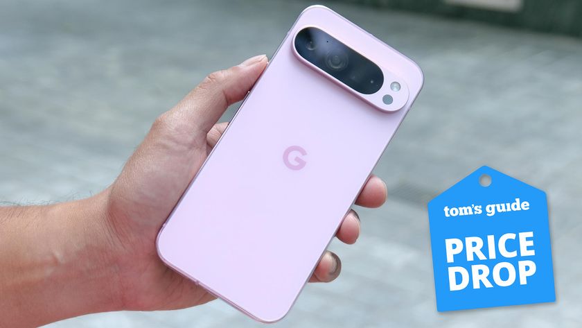 Pixel 9 Pro XL held in the hand with price drop badge.