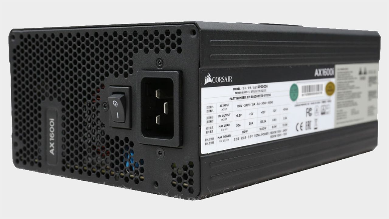 Corsair AX1600i power supply with cables.