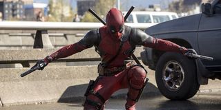 Deadpool holding guns