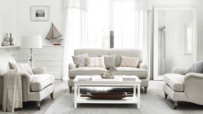 Light gray sofa in neutral living room by Neptune