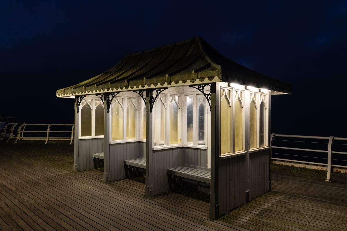 Photo of seating on a pier at night taken with a Canon RF 15-35mm f/2.8L IS USM and Canon EOS R1