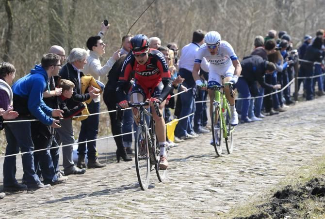 Taylor Phinney (Team BMC) leads the race through the Arenberg forest
