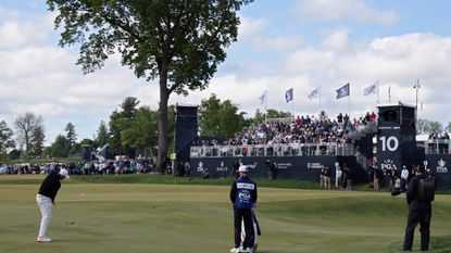 Scottie Scheffler plays a chip shot at the 2026 PGA Championship