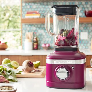 blender and beetroot with table