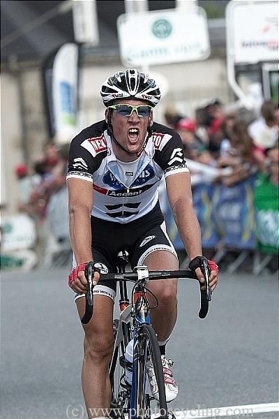 Degand crosses the line.