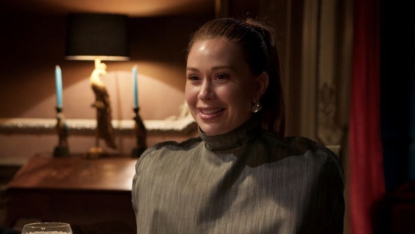 Gabby smiling at the seer dinner on The Traitors