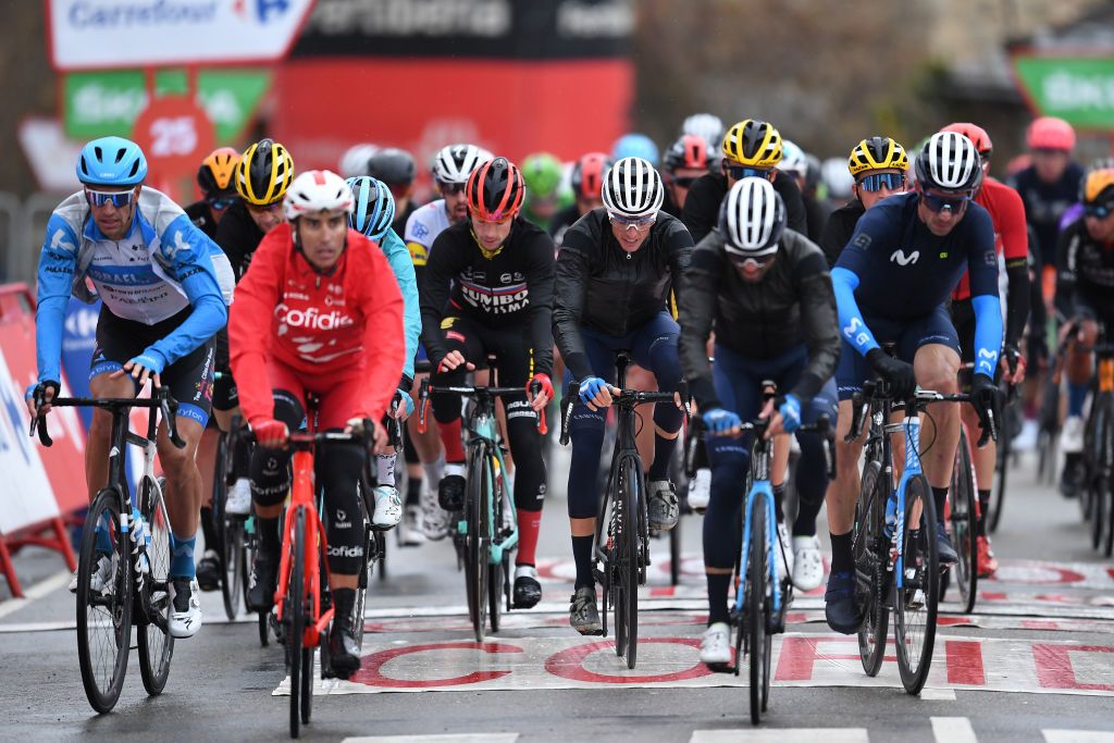 PUEBLA DE SANABRIA SPAIN NOVEMBER 05 Arrival Primoz Roglic of Slovenia and Team Jumbo Visma Red Leader Jersey Enric Mas Nicolau of Spain and Movistar Team White Best Young Rider Jersey during the 75th Tour of Spain 2020 Stage 15 a 2308km stage from Mos to Puebla de Sanabria 924m lavuelta LaVuelta20 La Vuelta on November 05 2020 in Puebla de Sanabria Spain Photo by David RamosGetty Images