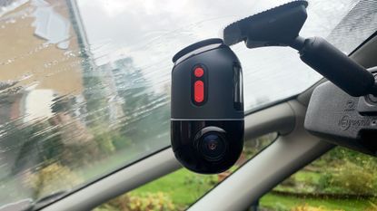 70mai dash cam omni mounted to a car windscreen, seen from the passenger seat