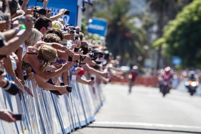 Fans reach for a photo as Taylor Phinney (BMC) comes into the finish