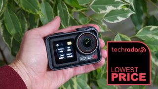 DJI Osmo Action 5 Pro camera in-hand with a deals logo