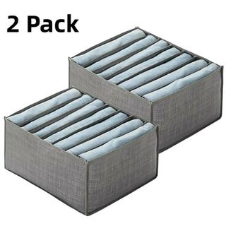 Two grey deep drawer organizing baskets with dividing sections in between folded tops